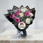 Pink and White Rose Bouquet in Black Gold-Trimmed Wrapping by Ideal Fresh Flower