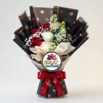 Red and White Rose Bouquet in Polka Dot Wrapping by Ideal Fresh Flower