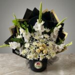 White Gladiolus Flower Arrangement with Chocolates in Black Box by Ideal Fresh Flower