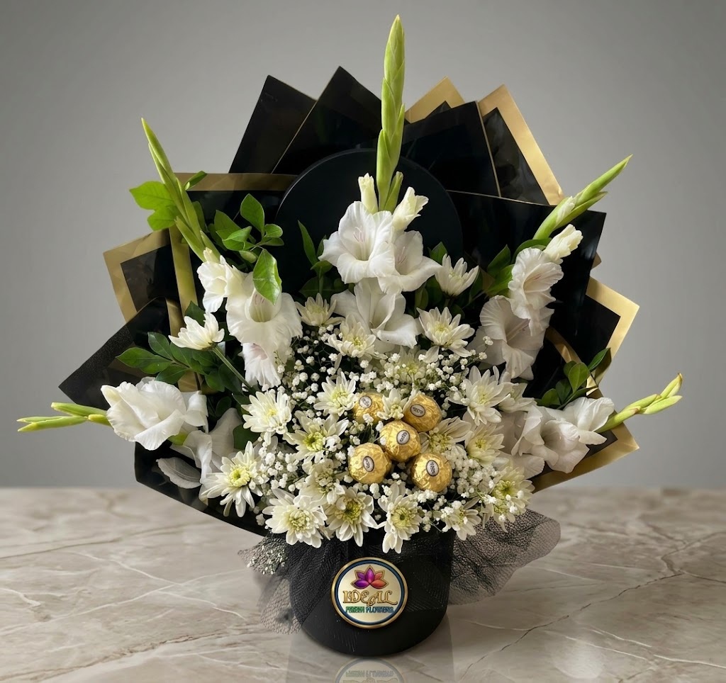 18 White Gladiolus Flower Arrangement with Chocolates in Black Box by Ideal Fresh Flower - Image 1