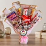 Chocolate and Snack Gift Bouquet with Pink Baby's Breath by Ideal Fresh Flower