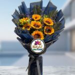 Sunflower Bouquet with Lavender Filler in Navy Wrapping by Ideal Fresh Flower