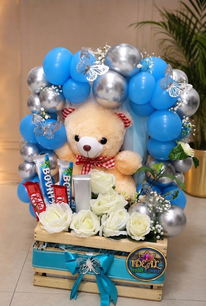 51 Teddy Bear and Balloon Gift Crate with White Roses and Chocolates by Ideal Fresh Flower - Image 1