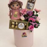 Doll and Chocolate Flower Box with Pink and Purple Flowers by Ideal Fresh Flower