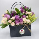 Flower Handbag Arrangement with Purple Roses and Cream Spray Roses by Ideal Fresh Flower