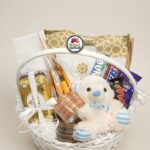 Gift Hamper Basket with Chocolates and Teddy Bear by Ideal Fresh Flower