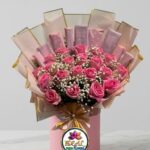 Pink Rose and Chocolate Bouquet in Pink Cylinder Box by Ideal Fresh Flower