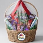 Chocolate and Snack Gift Basket with Red Ribbon by Ideal Fresh Flower