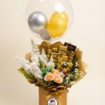 Gold Chocolate and Flower Balloon Box with Peach Roses by Ideal Fresh Flower